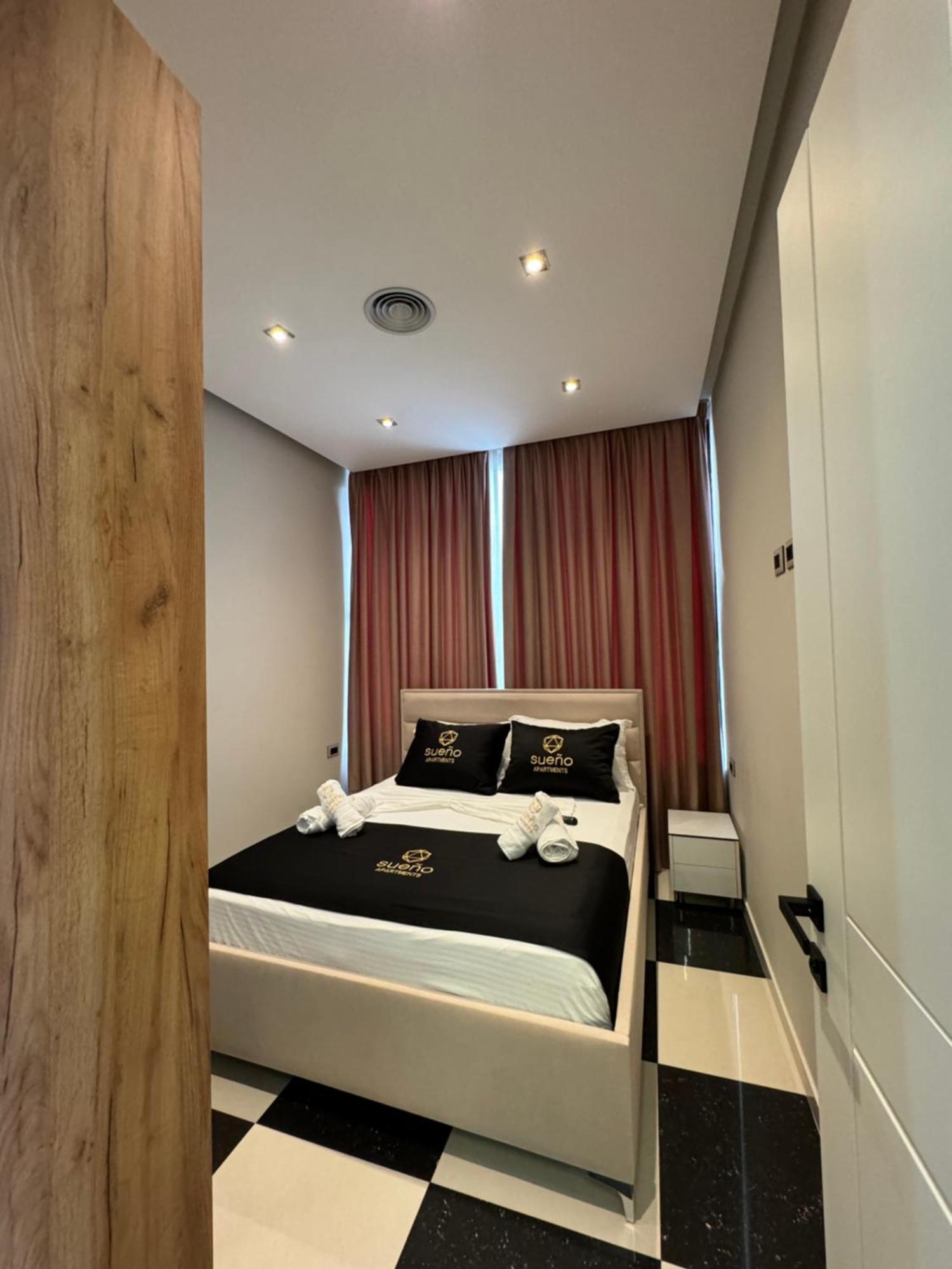 Sueno Apartments & Suites Тирана Стая снимка