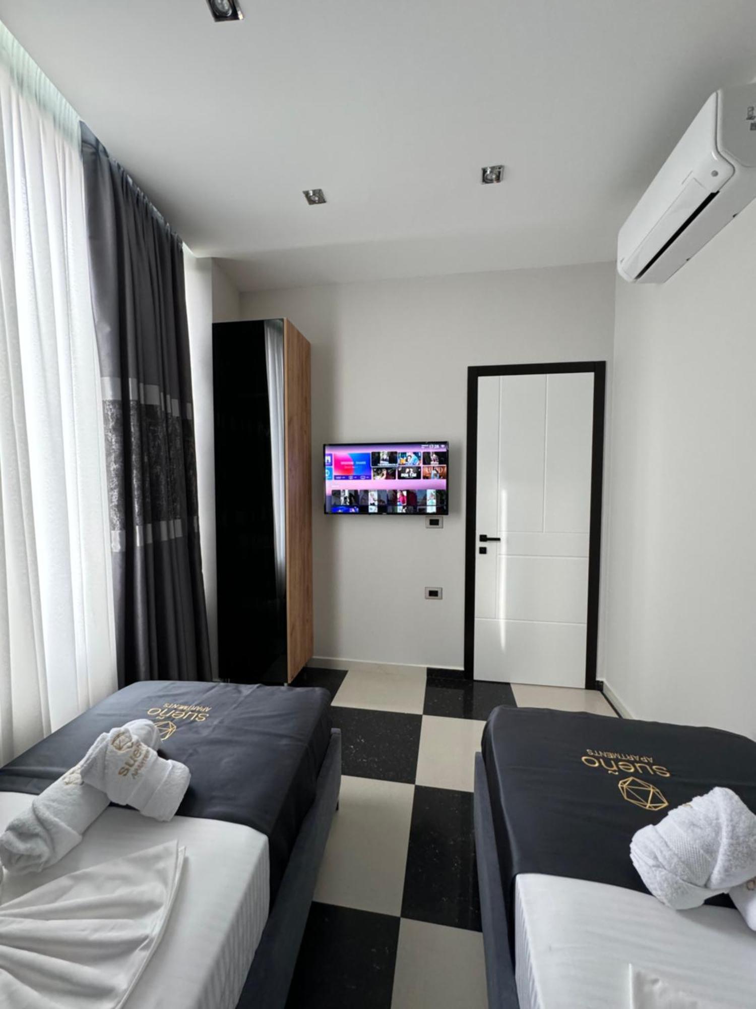 Sueno Apartments & Suites Тирана Стая снимка