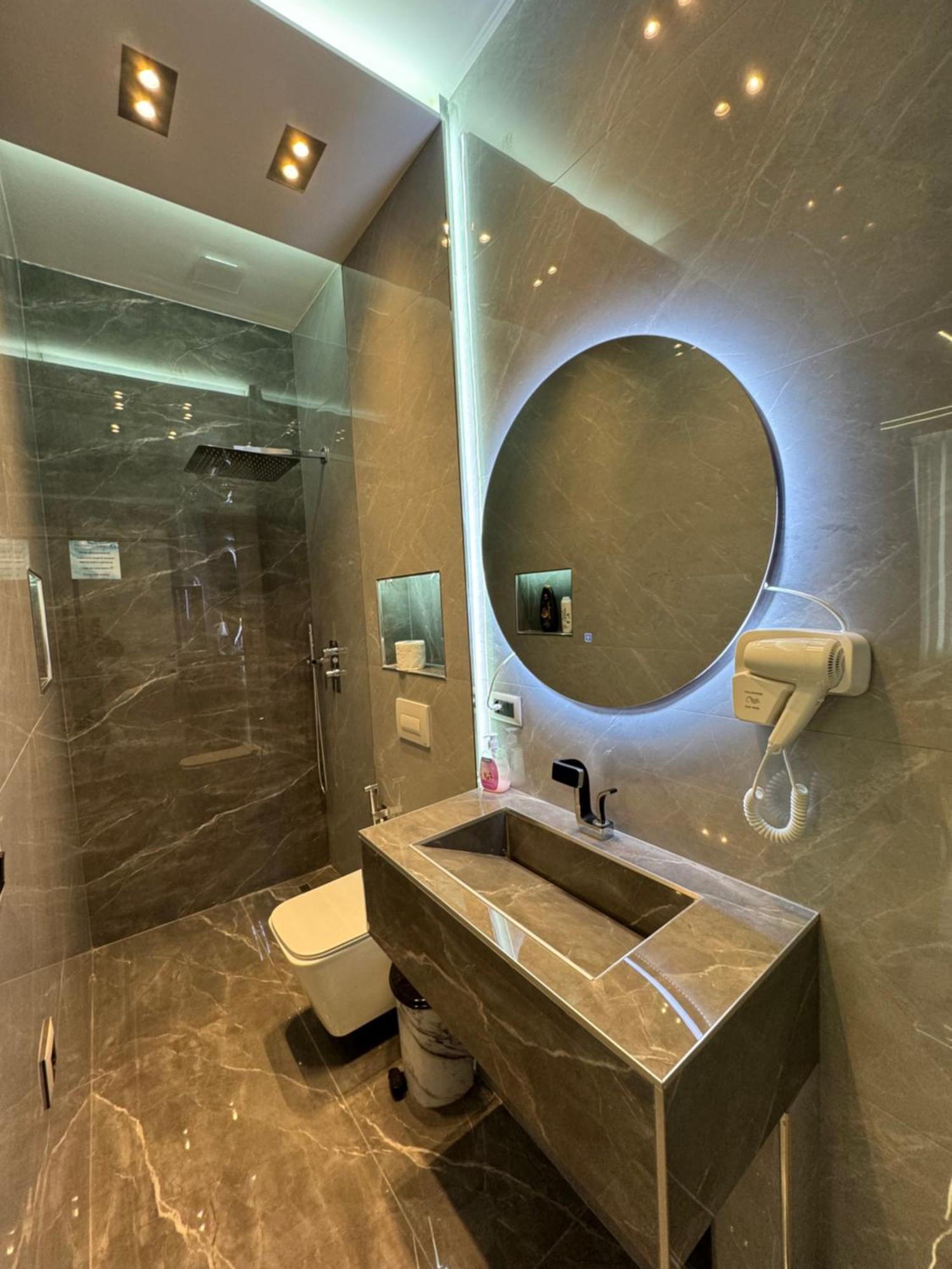 Sueno Apartments & Suites Тирана Стая снимка