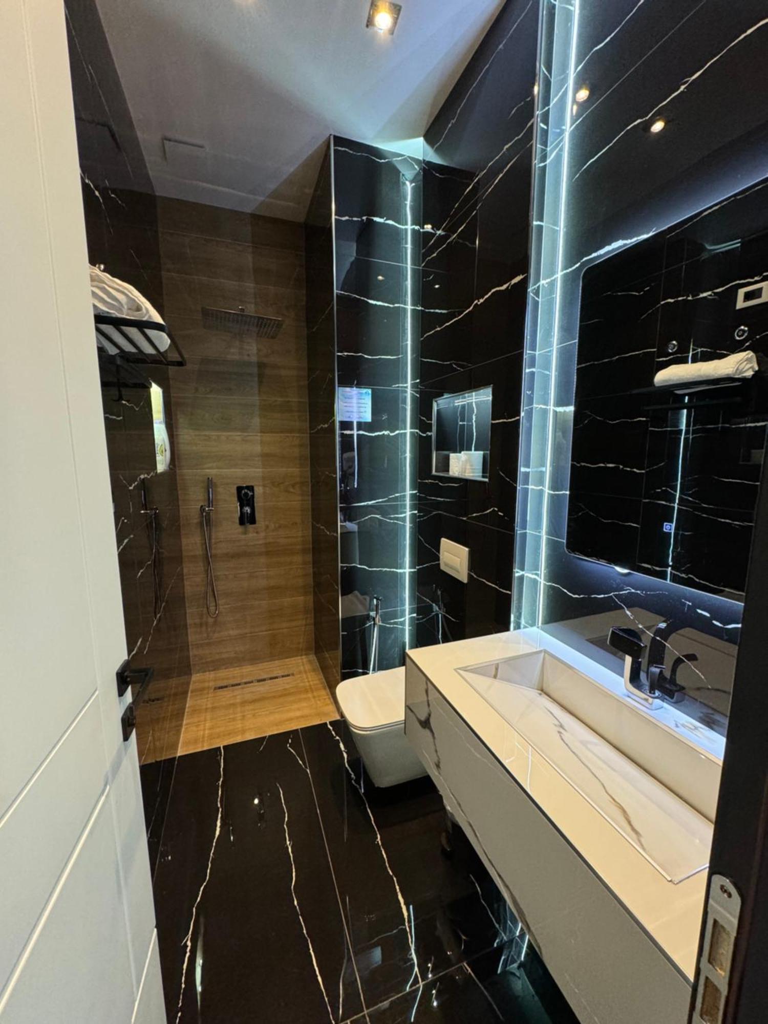 Sueno Apartments & Suites Тирана Стая снимка
