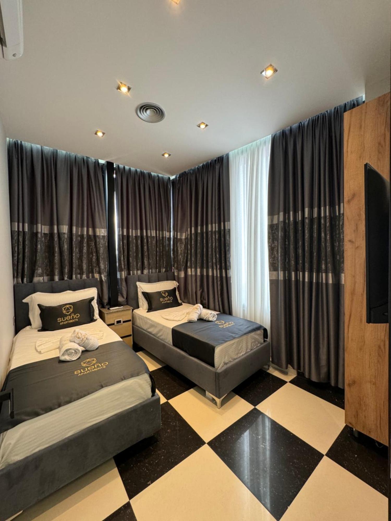 Sueno Apartments & Suites Тирана Стая снимка